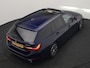 BMW 3-Serie Touring 320e xDrive PHEV 204pk Dealer O.H. | Trekhaak Af Fabriek | Panodak | Adaptive Cruise | Camera | Lederen Sportstoelen Memory & Verwarmd | Widescreen Navi | Blis | Apple Carplay | DAB | Iconic Glow Grille | Plug In Hybrid |