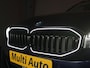 BMW 3-Serie Touring 320e xDrive PHEV 204pk Dealer O.H. | Trekhaak Af Fabriek | Panodak | Adaptive Cruise | Camera | Lederen Sportstoelen Memory & Verwarmd | Widescreen Navi | Blis | Apple Carplay | DAB | Iconic Glow Grille | Plug In Hybrid |