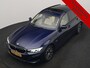 BMW 3-Serie Touring 320e xDrive PHEV 204pk Dealer O.H. | Trekhaak Af Fabriek | Panodak | Adaptive Cruise | Camera | Lederen Sportstoelen Memory & Verwarmd | Widescreen Navi | Blis | Apple Carplay | DAB | Iconic Glow Grille | Plug In Hybrid |