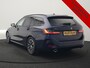 BMW 3-Serie Touring 320e xDrive PHEV 204pk Dealer O.H. | Trekhaak Af Fabriek | Panodak | Adaptive Cruise | Camera | Lederen Sportstoelen Memory & Verwarmd | Widescreen Navi | Blis | Apple Carplay | DAB | Iconic Glow Grille | Plug In Hybrid |