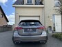Mercedes-Benz A-klasse 180 AMG Aut Panoramadak Nightpakket Widescreen AmbientLight Keyless SportLeder Led Camera 18" Pdc