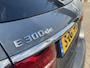Mercedes-Benz E-klasse E 300 de Estate Business Solution AMG | Distronic Plus | Smartphone integratie | Panoramadak | 360 Camera | Trekhaak | Stoelverwarming | Spiegelpakket
