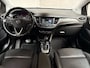 Opel Crossland 1.2 Turbo Elegance Automaat (APPLE CARPLAY, LEDER, CLIMATE, STUUR/STOELVERWARMING, SPORTSTOELEN, GETINT GLAS, LED KOPLAMPEN, NIEUWSTAAT)