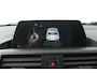 BMW 1-Serie 116i Essential (NAVIGATIE, CRUISE CONTROL, PARKEERSENSOREN)