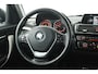 BMW 1-Serie 116i Essential (NAVIGATIE, CRUISE CONTROL, PARKEERSENSOREN)
