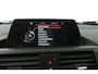 BMW 1-Serie 116i Essential (NAVIGATIE, CRUISE CONTROL, PARKEERSENSOREN)
