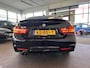 BMW 4-Serie Gran Coupe 420i Centennial High Executive M Sport | Panoramadak | Lederen bekleding | Head up display | Cruise control | Climate control | Lane assist | Nederlands geleverd | Achteruitrijcamera | Adaptief onderstel | Stoelverwarming | Elek. kofferklep | Elek. inklap