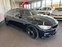 BMW 4-Serie Gran Coupe 420i Centennial High Executive M Sport | Panoramadak | Lederen bekleding | Head up display | Cruise control | Climate control | Lane assist | Nederlands geleverd | Achteruitrijcamera | Adaptief onderstel | Stoelverwarming | Elek. kofferklep | Elek. inklap