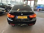 BMW 4-Serie Gran Coupe 420i Centennial High Executive M Sport | Panoramadak | Lederen bekleding | Head up display | Cruise control | Climate control | Lane assist | Nederlands geleverd | Achteruitrijcamera | Adaptief onderstel | Stoelverwarming | Elek. kofferklep | Elek. inklap