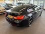 BMW 4-Serie Gran Coupe 420i Centennial High Executive M Sport | Panoramadak | Lederen bekleding | Head up display | Cruise control | Climate control | Lane assist | Nederlands geleverd | Achteruitrijcamera | Adaptief onderstel | Stoelverwarming | Elek. kofferklep | Elek. inklap