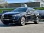 BMW X6 M50d | 380 pk | Schuifdak | Stoelventilatie | Leer | Adaptive Cruise | Camera | Trekhaak | Head-Up | 21" | M-pakket | Marge