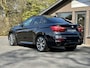 BMW X6 M50d | 380 pk | Schuifdak | Stoelventilatie | Leer | Adaptive Cruise | Camera | Trekhaak | Head-Up | 21" | M-pakket | Marge