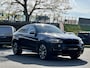 BMW X6 M50d | 380 pk | Schuifdak | Stoelventilatie | Leer | Adaptive Cruise | Camera | Trekhaak | Head-Up | 21" | M-pakket | Marge