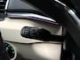 Skoda Karoq 1.5 TSI ACT Deluxe 150Pk Automaat (PANORAMADAK, APPLE CARPLAY, LEDER, ZWART HEMEL, CANTON AUDIO, STOELVERWARMING, ADAPTIVE CRUISE, KEYLESS, GETINT GLAS, CAMERA, NIEUWSTAAT)