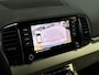 Skoda Karoq 1.5 TSI ACT Deluxe 150Pk Automaat (PANORAMADAK, APPLE CARPLAY, LEDER, ZWART HEMEL, CANTON AUDIO, STOELVERWARMING, ADAPTIVE CRUISE, KEYLESS, GETINT GLAS, CAMERA, NIEUWSTAAT)