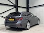 BMW 3-Serie Touring 320e xDrive Business | panorama | navi | led | trekhaak |