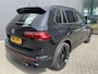Volkswagen Tiguan 1.5 TSI 2x R-line Achteruitrijcamera - Virtual dashboard - Apple carplay - Navigatie - Parkeersensoren - Licht metalen velgen 20 inch - Mistlampen - Dakrails - IQ light - Hill hold functie - Radio - Extra getint glas - Lederen bekleding - Stuur multifunctioneel - Stoelverwarming - stuurverwarming - Regensensor - Bluetooth