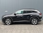 Hyundai Tucson 1.6 T-GDI PHEV 265pk Premium Sky 4WD (299,- p/m Demo Deal!) | Leder | Carplay | Climate | Keyless | Navigatie | Elek. Klep | Full - Led | 360 Camera | KRELL Audio | Elek. Stoelen | 19" Lichtmetaal | Winterpakket | Stoelventilatie | Panoramadak | Dodehoek Detectie