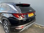 Hyundai Tucson 1.6 T-GDI 265pk PHEV Premium 4WD (299,- p/m Demo Deal!) | Leder | Carplay | Climate | Keyless | Navigatie | Elek. Klep | Full - Led | 360 Camera | KRELL Audio | Elek. Stoelen | 19" Lichtmetaal | Winterpakket | Stoelventilatie | Dodehoek Detectie