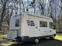 HYMER Compact E 510 2.5 TDi 590 M | 5 zits -3 slaapplaatsen | Airco | Cruise | Dakventilator | Langsbank | Douche-wc | Hefbed | APK Nw | Fietsendrager op chassis | inruil koopje!