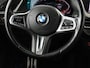 BMW 1-Serie 118i High Executive Edition | M Sport | Panoramadak | Leder | Stoelverwarming | Camera | Carplay | Live Cockpit | Sfeerverlichting | Trekhaak | Navigatie | Sportstoelen | Park Assist | DAB | Climate control