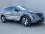Nissan Ariya Evolve 91 kWh / Elektrische Schuif/Kantel Dak / Apple Carplay&Android Auto / Trekhaak (750 KG) / Adaptieve Cruise Control / 360 Camera / Alle Stoelen&Stuur Verwarming / Keyless Entry/Start / Elektrische Achterklep / Memory Seats /