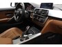 BMW 4-Serie Gran Coupe 420i Centennial High Executive | SCHUIF/KANTELDAK | LEDER | STOELVERWARMING | CAMERA | 18"
