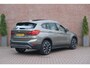 BMW X1 sDrive20i 192pk Aut. Essential | Navi | Climate | Panoramadak | Camera | Elektrische Achterklep | PDC