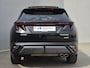 Hyundai Tucson 1.6 T-GDI HEV 215 pk N Line Sky / Facelift / Fabrieksgarantie tot 06-2029 / Dealer onderhouden / Panorama schuifdak / Navigatie / Camera 360° / Elektrische stoelen & klep / Stuur-, stoel- en achterbankverwarming / Apple Carplay Android / 19" LM wielen /