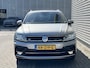 Volkswagen Tiguan 1.4 TSI R-line / Digitaal dashboard / Pano / Navigatie / App connect / Camera / Zwenkbare trekhaak / Allseason /