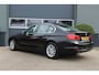 BMW 3-Serie 320i High Executive NL Auto | 2e Eigenaar | Navi | Leder | Airco | Cruise | Bluetooth | LMV Goede banden Zeer nette
