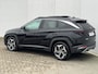 Hyundai Tucson 1.6 T-GDI HEV Premium Sky / Schuif - kanteldak / Afn. trekhaak / Lederen interieur / Navigatie / Verwarmde + gekoelde stoelen + memory / 19 inch LMV.