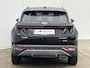 Hyundai Tucson 1.6 T-GDI HEV Premium Sky / Schuif - kanteldak / Afn. trekhaak / Lederen interieur / Navigatie / Verwarmde + gekoelde stoelen + memory / 19 inch LMV.