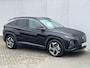 Hyundai Tucson 1.6 T-GDI HEV Premium Sky / Schuif - kanteldak / Afn. trekhaak / Lederen interieur / Navigatie / Verwarmde + gekoelde stoelen + memory / 19 inch LMV.