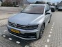 Volkswagen Tiguan 2.0 TSI 4Motion R-Line 7p 7 zits r-line in en exterieur panoramadak 20" LMV Suzuka head up display discover pro navi digital cockpit pro area view rondom zicht camera verwarmbare voorruit stoelverwarming elektrische achterklep keyless entry wegklapbare trekhaak side assist keyless entry VW Dealer onderhouden
