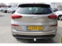 Hyundai Tucson 1.6 T-GDI Premium | Automaat | Stoelverwarming voor+achter | Adaptieve Cruise Control | Electrisch verstelbare bestuurderstoel | Trekhaak | Navigatie | | Achterbank in delen neerklapbaar | Achterbank verwarmd | Airco (automatisch)