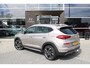 Hyundai Tucson 1.6 T-GDI Premium | Automaat | Stoelverwarming voor+achter | Adaptieve Cruise Control | Electrisch verstelbare bestuurderstoel | Trekhaak | Navigatie | | Achterbank in delen neerklapbaar | Achterbank verwarmd | Airco (automatisch)