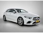 Mercedes-Benz A-klasse 180 Business Solution AMG | AMG Line | Stoelverwarming | Cruise Control | Inclusief 24 maanden Mercedes-Benz Certified garantie voor Europa.