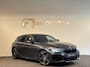 BMW 1-Serie M140i xDrive Executive Harman Kardon|Volleder