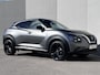 Nissan Juke 1.0 DIG-T Tekna / Fabrieksgarantie tot 03-2028  <100.000 km / Automaat / Leder / Camera 360° / Cold Pack / Stuur-, stoel- & voorruitverwarming / Navigatie / Apple Carplay Android / 19" LM + All Season banden /