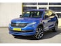 Skoda Kodiaq 1.5 TSI 150PK! Automaat Sportline Business BJ2020 Lmv 20" | Led V+A | Pdc | Keyless entry | Trekhaak afneembaar | Elek. achterklep | Achteruitrijcamera | App-Connect | Navi | Virtual cockpit | Dashboard verlichting | Sportstoelen/Sportstuur | Zwarte hemel