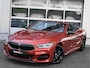 BMW 8-Serie M850i 531pk xDrive High Executive Sunset Orange 4W Sturing Carbon Core