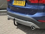 BMW X1 sDrive20i High Executive | NAP | Trekhaak | Cruise adaptief | Stoelverwarming | LED | Achteruitrijcamera | Climate Control | Heads-up display | Elektrisch glazen panorama-dak |