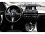 BMW 1-Serie 118i Edition M Sport Shadow High Exe. / Leder / Navigatie / Parkeerhulp achter / Keyless / 18'' / Getint glas / Stoelverwarming / Cruise Control