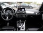 BMW 1-Serie 118i Edition M Sport Shadow High Exe. / Leder / Navigatie / Parkeerhulp achter / Keyless / 18'' / Getint glas / Stoelverwarming / Cruise Control