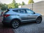 Hyundai Santa Fe 2.4i GDI 4WD i-Catcher 7p. | Clima | Cruise | Navi | Leer | Panoramadak | Camera | Stoelverwarming |