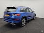 Skoda Kodiaq 1.5 TSI Sportline Business 7 persoons 150pk | Automaat | Schuifkanteldak | Camera | PDC voor & achter | Trekhaak | Stoel en stuurverw. | Apple Carplay of Android Auto | Elektr stoel met geheugen | Navigatie