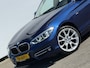 BMW 1-Serie 118d High Executive Sport | Leer | Xenon | Stoelverwarming | Clima | Cruise | Navi | Trekhaak | Camera | Automaat !!