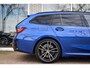BMW 3-Serie Touring 320e M-Sport Pro Pano Trekhaak Leder Elc Stoelen