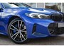 BMW 3-Serie Touring 320e M-Sport Pro Pano Trekhaak Leder Elc Stoelen